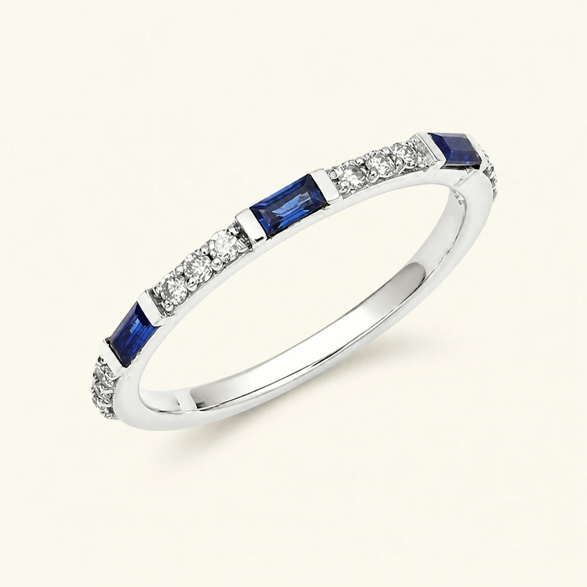 Semi eternity baguette sapphire and round diamonds ring in 18K white gold