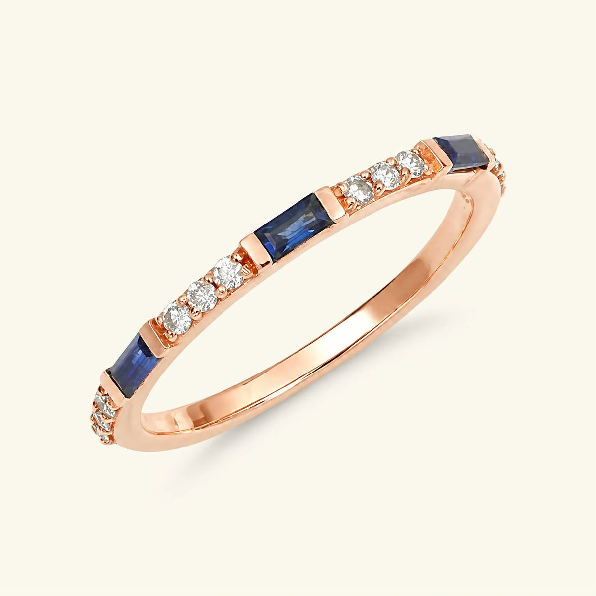 Semi eternity baguette sapphire and round diamonds ring in 18K rose gold