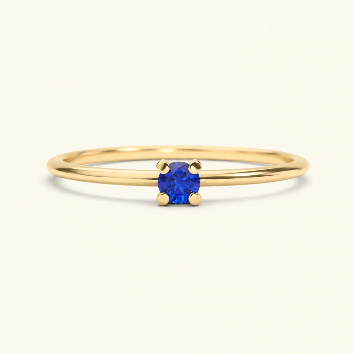 Yellow gold solitaire sapphire ring