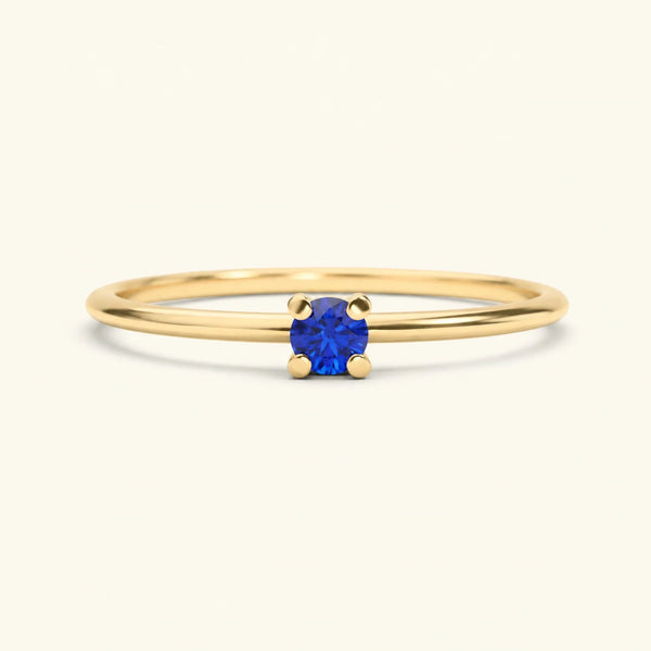 Yellow gold solitaire sapphire ring