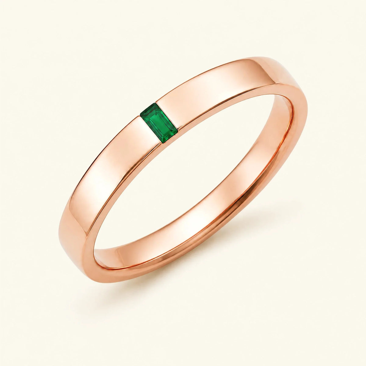 Solitaire baguette cut emerald ring for men in rose gold