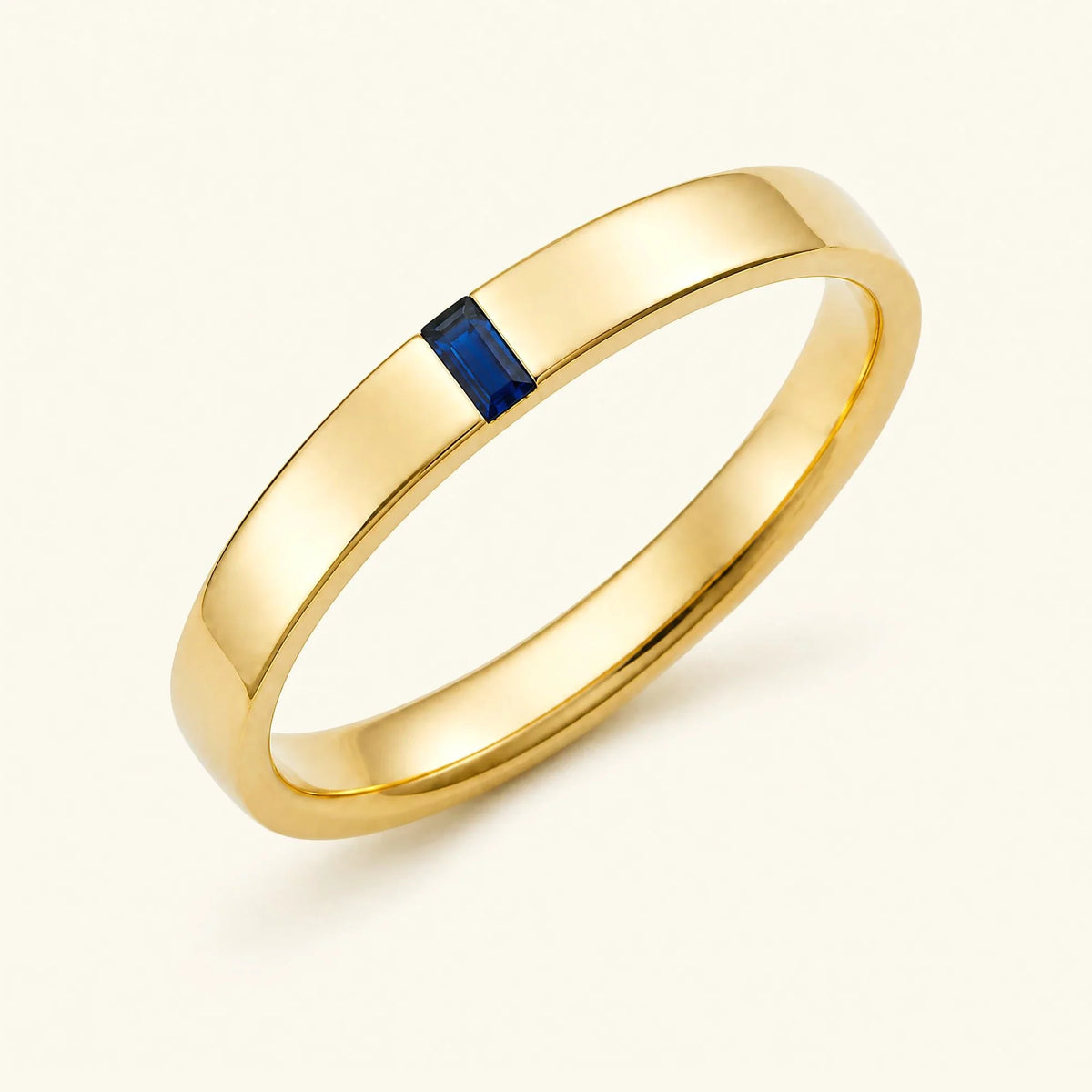 Baguette cut sapphire solitaire ring for men in yellow gold