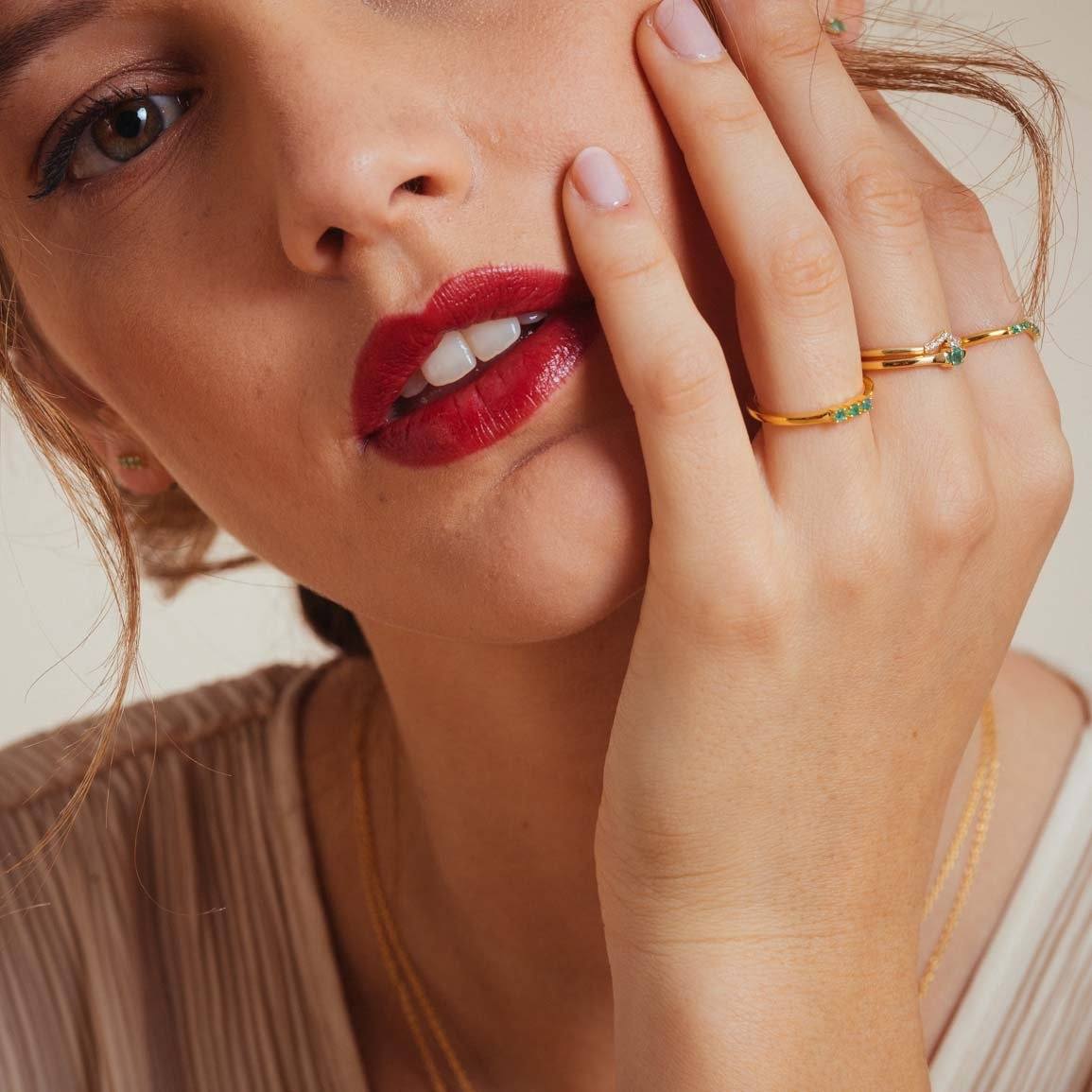 ring with three natural emeralds