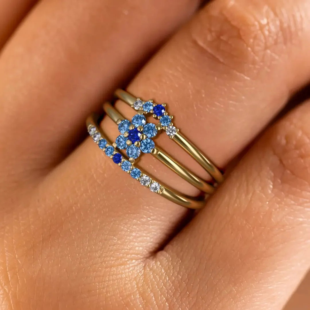 Blue and white horizon sapphire rings by Mayuri Paris