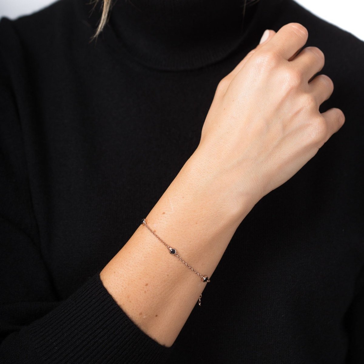 dhanya bezel black diamond bracelet in yellow gold