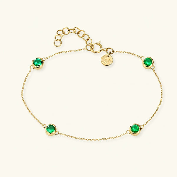 Dhanya bracelet with closed settings of four natural emeralds