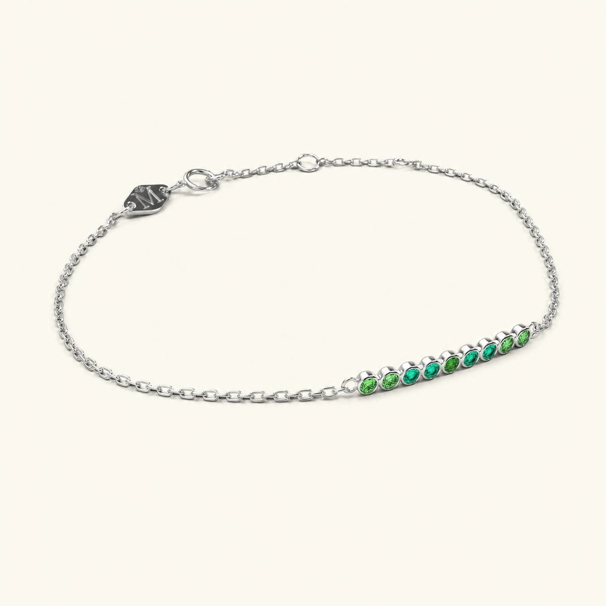 Noor white gold bracelet for women with emerald