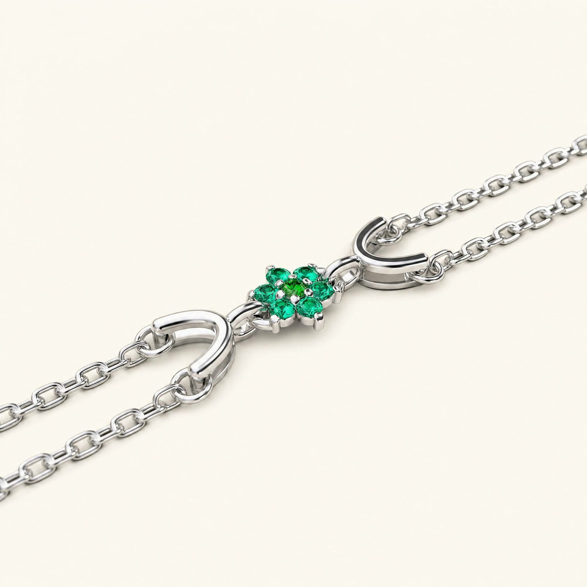 Surya white gold bracelet for women with emerald