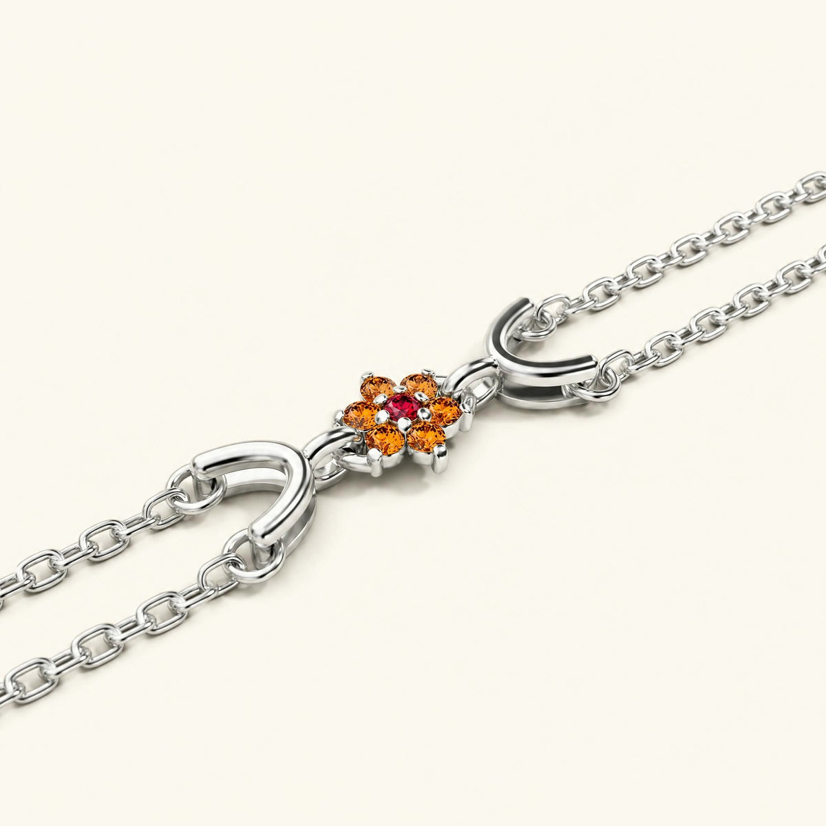 Surya white gold bracelet for women with orange sapphire