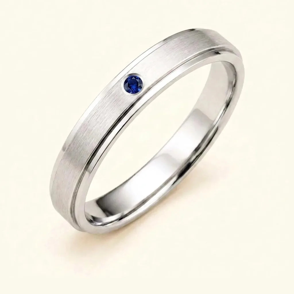 Dhruva men's ring in 18K white gold with a flush-set sapphire, a gift for a best man or witness