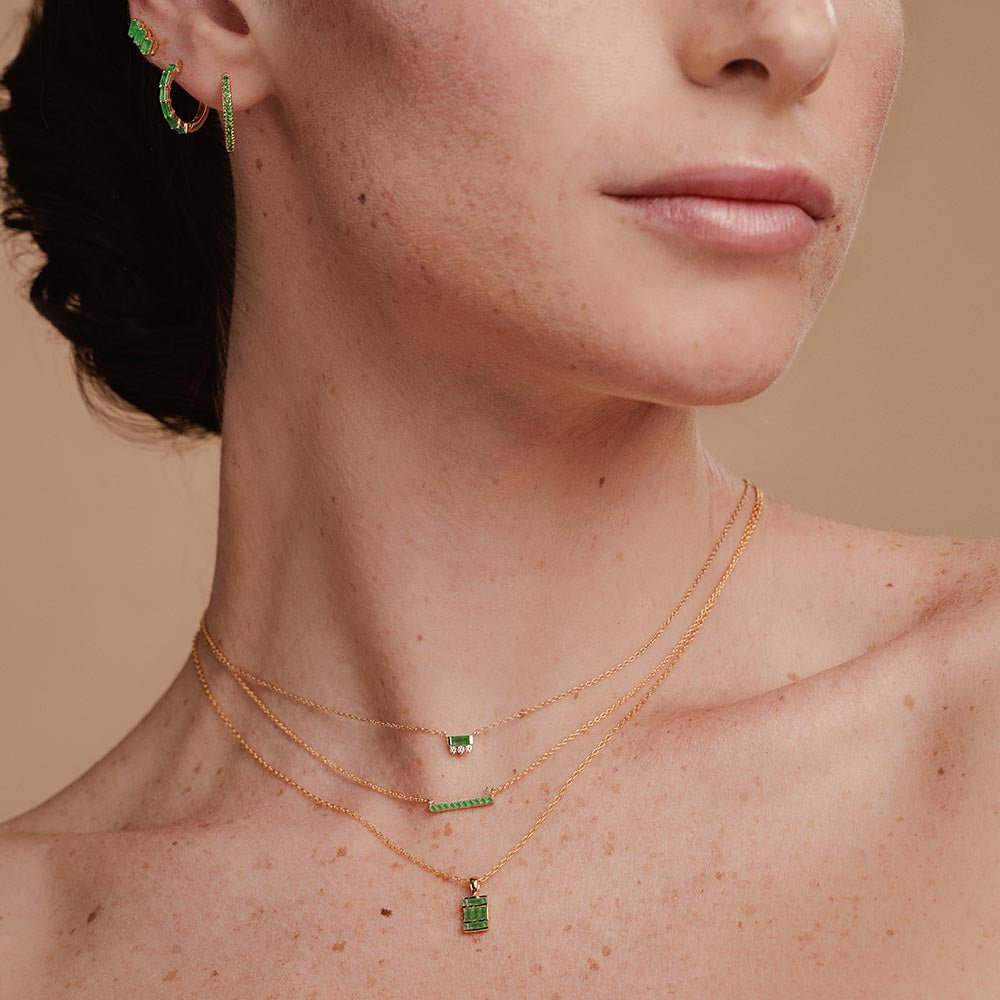 Emerald necklace set for women in yellow gold
