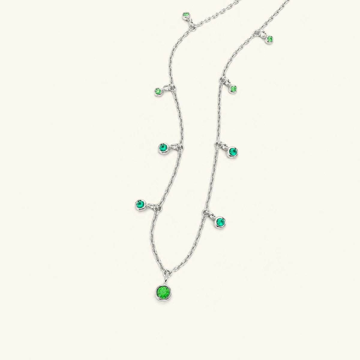 Megha white gold necklace with emerald