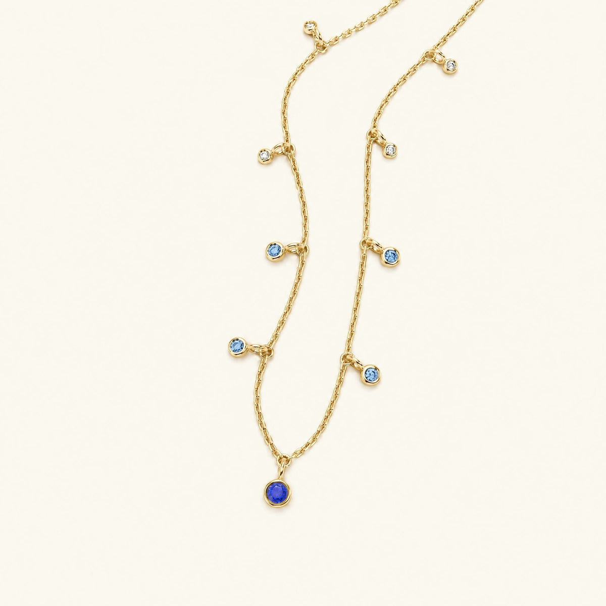 Megha yellow gold necklace with sapphire
