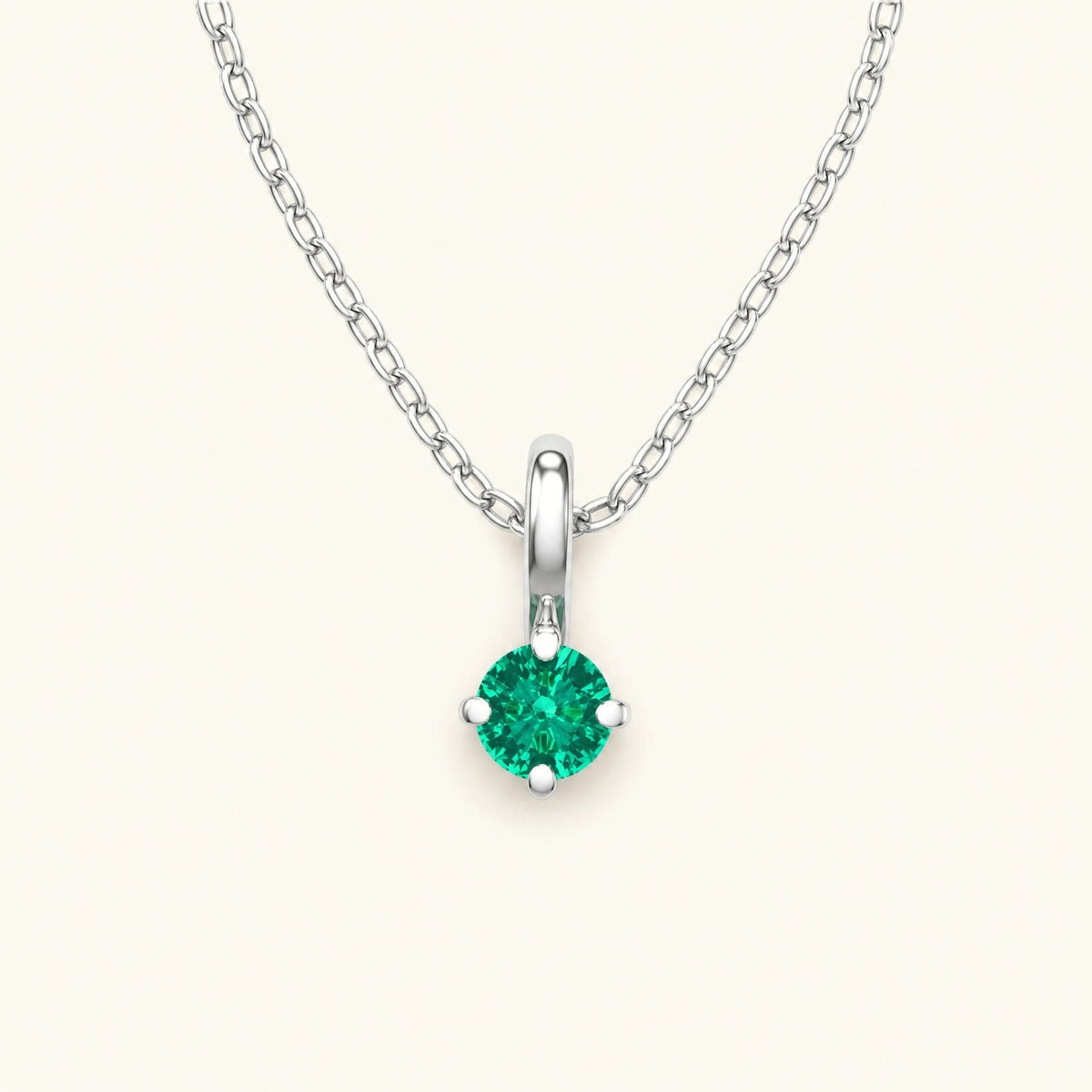 Saral white gold emerald solitaire necklace