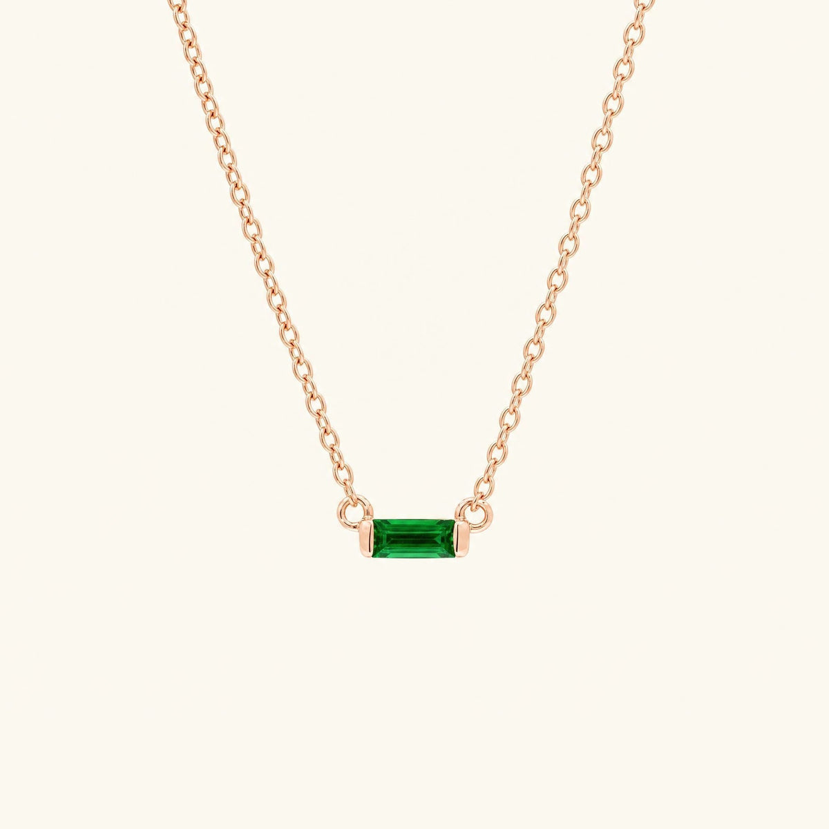 Shanti baguette cut emerald necklace in rose gold