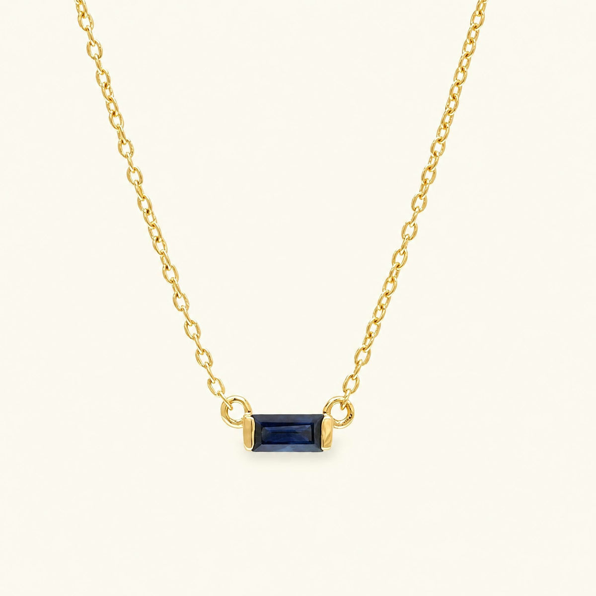Shanti baguette cut sapphire necklace in yellow gold