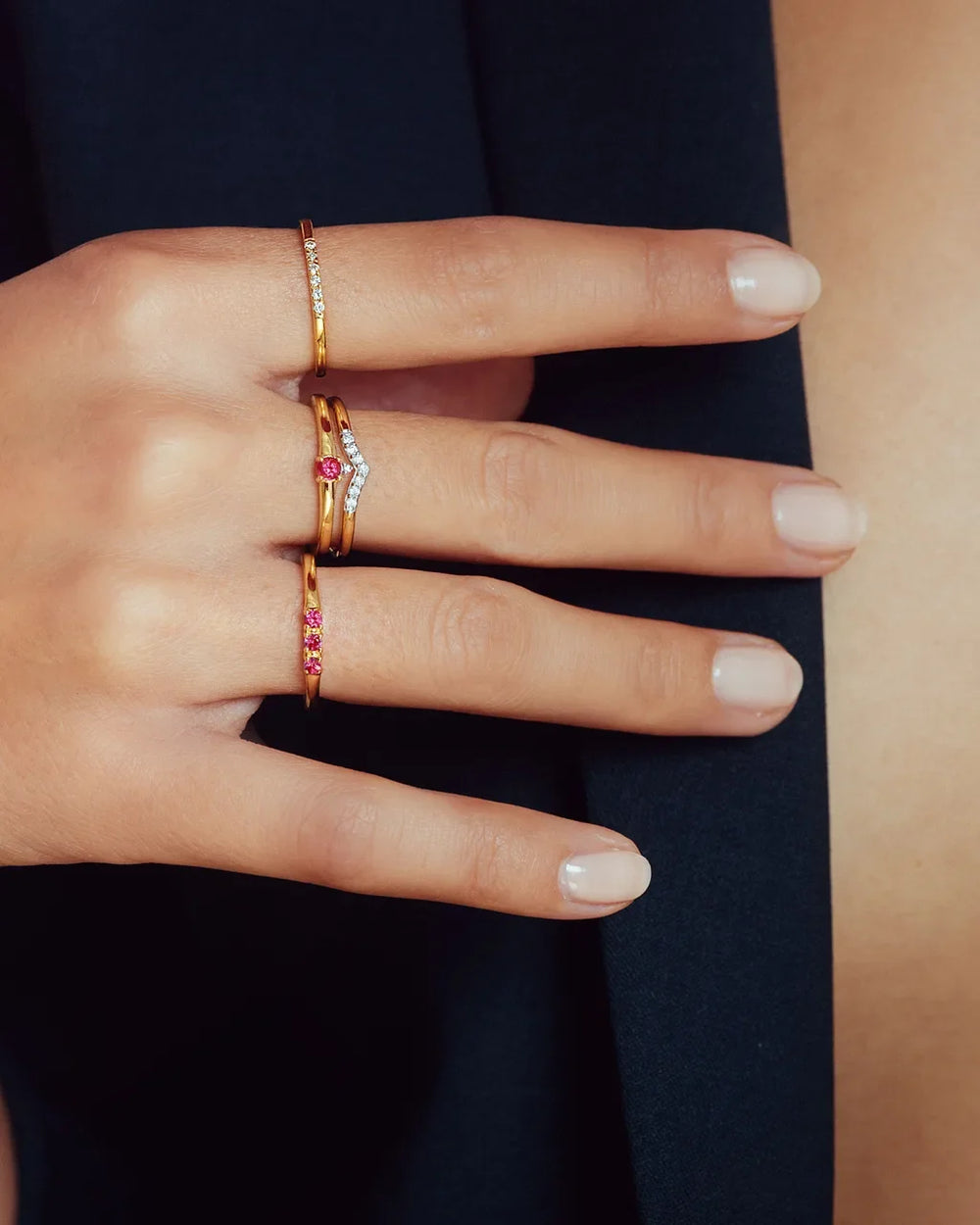 Devi, Sakshi and Tina ruby and diamond rings in 18K gold by Mayuri, elegantly worn