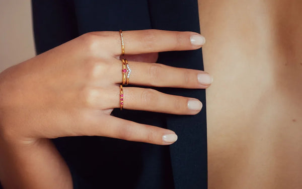 Devi, Sakshi and Tina ruby and diamond rings in 18K gold by Mayuri, elegantly worn