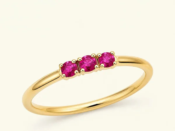 Tina ring in 18K yellow gold set with three rubies, by Mayuri