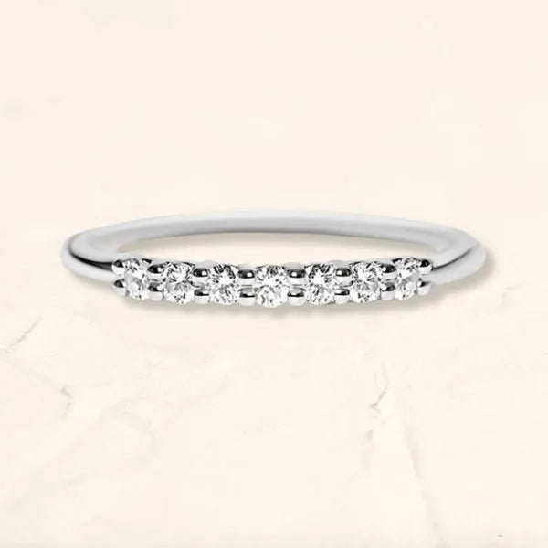 Vadha ring set with round brilliant diamonds in 18K white gold by Mayuri