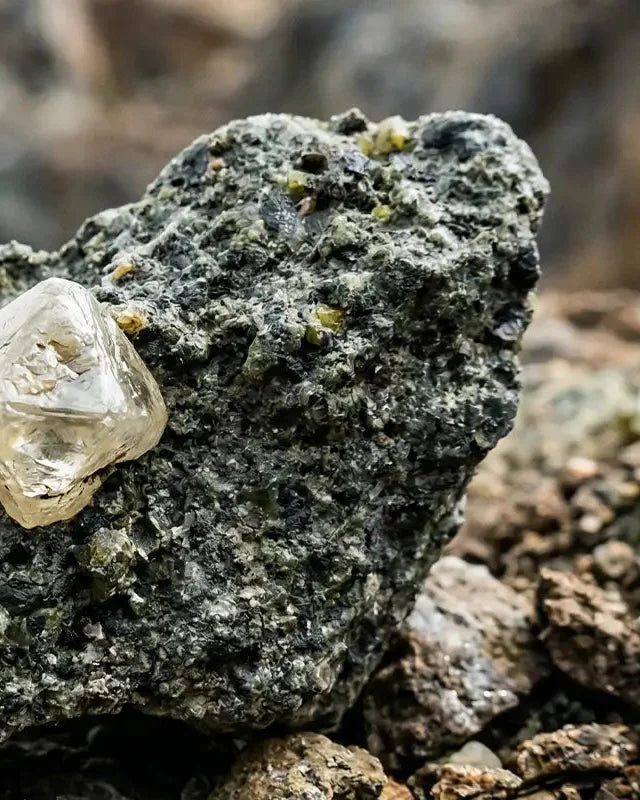 Rough diamond embedded in kimberlite, the volcanic rock from which diamonds originate