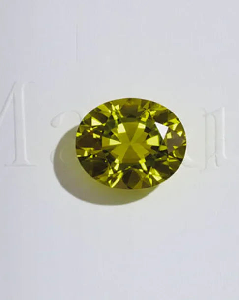 Oval-cut peridot, August birthstone, fine jewellery featuring brilliant olive-green facets