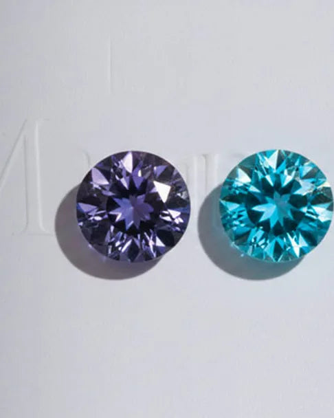 Violet tanzanite and round-cut blue topaz, December birthstones in fine jewellery