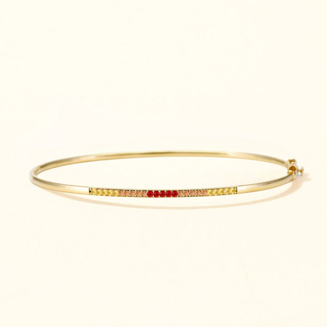 18-carat gold bangle Tarang sapphire sunset