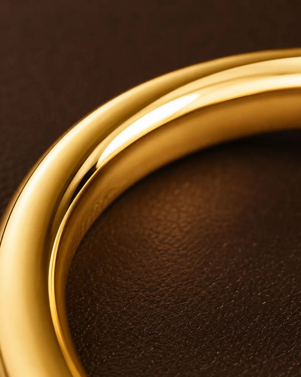 Macro of 18K yellow gold wedding rings showing the smooth, bright surface of the precious metal, Mayuri