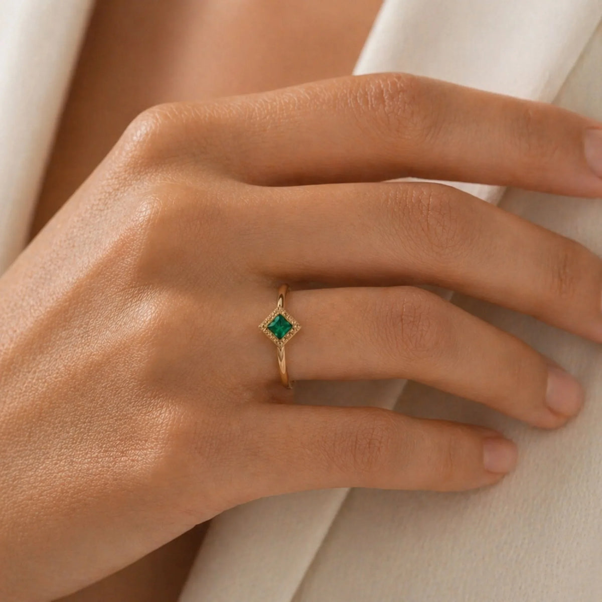 Indrani emerald ring worn