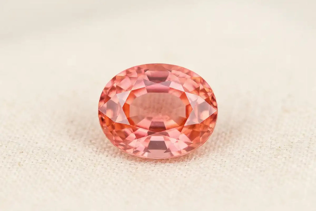 Natural padparadscha sapphire from Sri Lanka, displaying the rose-orange hue typical of the lotus flower