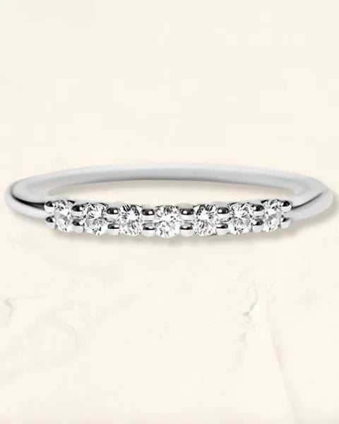 Vadha wedding ring in 18K white gold set with seven brilliant-cut diamonds by Mayuri