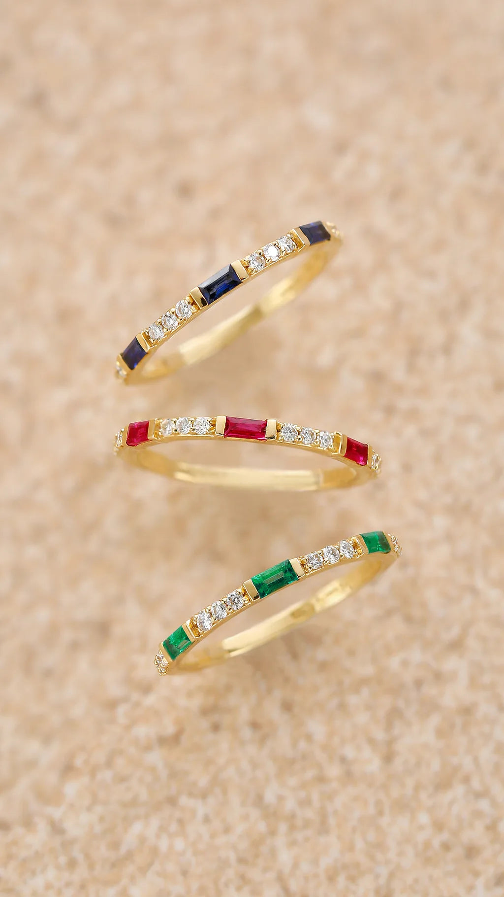 Mayuri rings in 18K yellow gold set with ruby, sapphire and emerald with diamonds