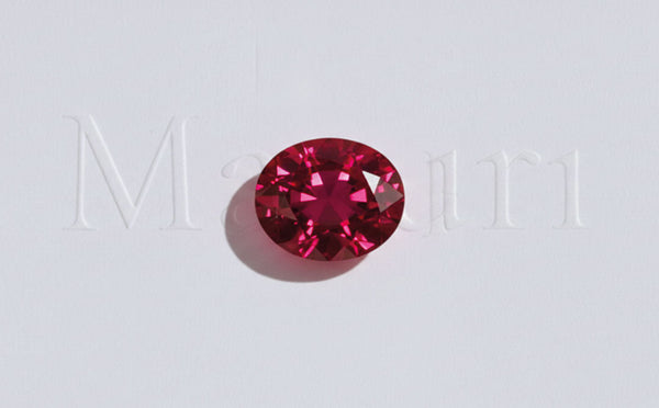 Vivid oval-cut ruby, the July birthstone in fine jewellery